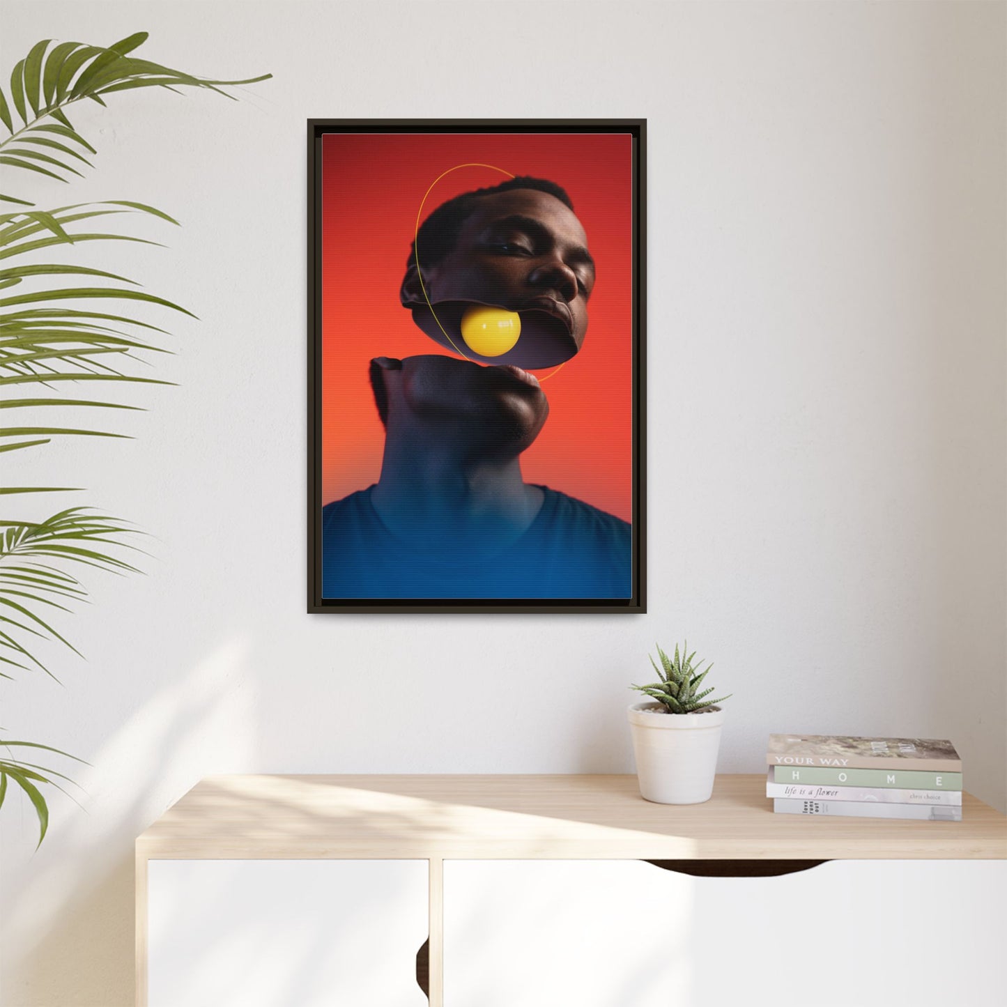 Framed Canvas Print — Floating Face With Yellow Orb